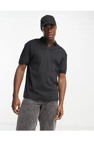 Calvin Klein Polo nera con colletto aperto