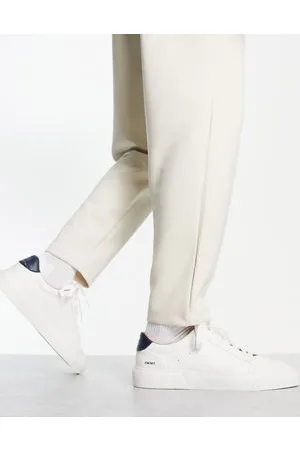 ASOS Sneakers bianche con pannelli in camoscio sintetico