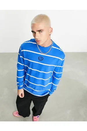 ASOS Maglietta comoda a maniche lunghe a righe con stampa di smile sul petto