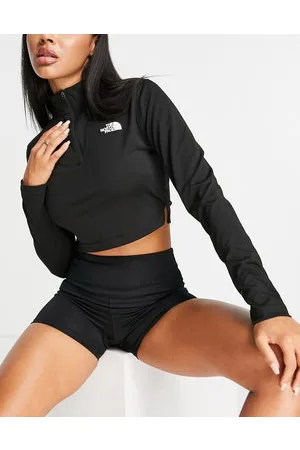 The North Face Training - T-shirt tecnica taglio corto nera a maniche lunghe