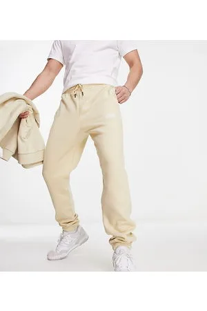 The North Face Essential - Joggers oversize color pietra - In esclusiva su ASOS