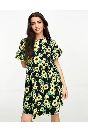 New Look Vestito grembiule corto in jersey con stampa di girasoli gialli