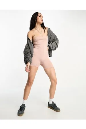 Bershka Tuta aderente rosa pallido senza cuciture con scollo dritto