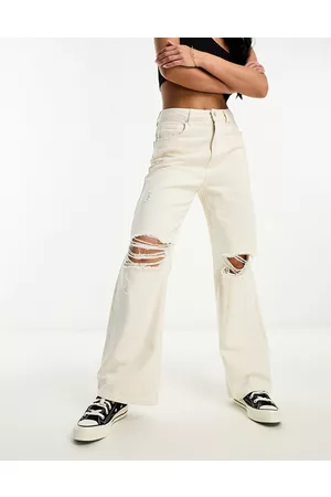 Miss Selfridge Jeans larghi écru con strappi sulle ginocchia