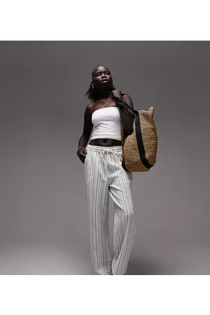 Topshop Pantaloni bianchi a fondo ampio in spugna a righe