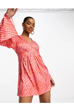 Style Cheat Vestito corto rosa e jacquard zebrato allacciato sul davanti