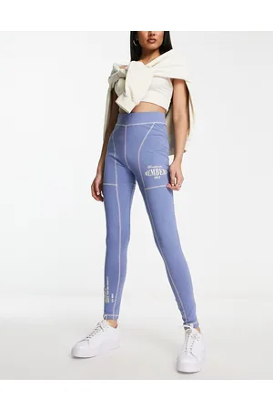 The Couture Club Leggings azzurri con grafica in coordinato