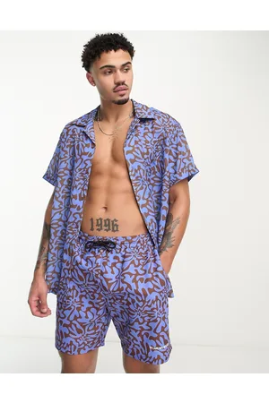 We Are We Wear Camicia a maniche corte stile surf da mare con stampa a ghirigori in coordinato