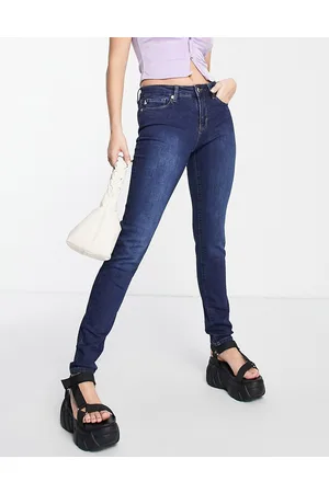 Moschino Jeans skinny medio con logo in strass