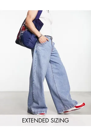 ASOS Jeans a fondo super ampio lavaggio con cuciture rosse a contrasto