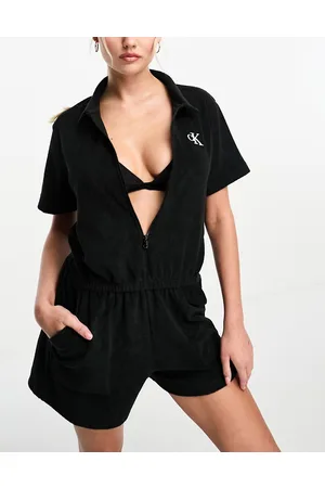 Calvin Klein Tuta corta nera da spiaggia con zip sul davanti e monogramma