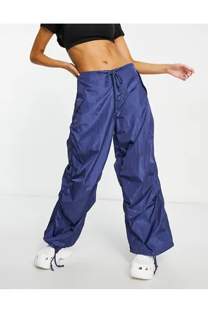 Edikted Pantaloni parachute a vita bassa con fondo ampio