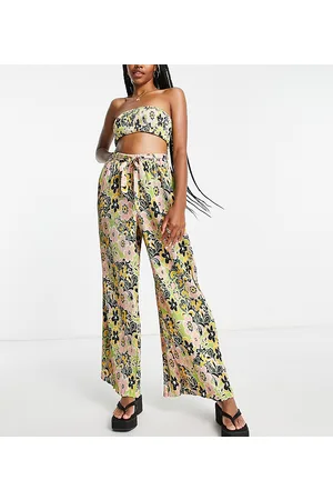 Topshop Pantaloni sartoriali a fondo ampio in plissé a fiori stile anni 