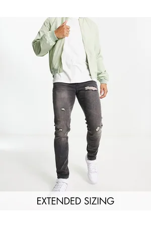 ASOS Jeans skinny slavato con abrasioni