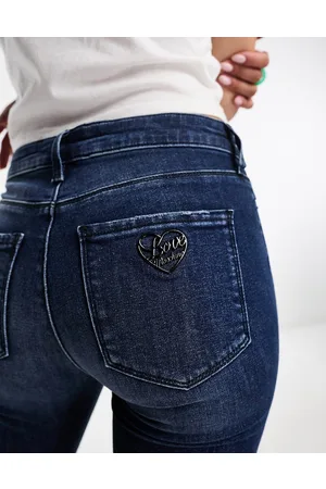 Moschino Jeans skinny con logo in strass