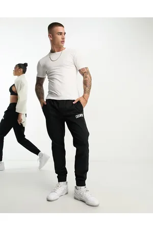 Champion Joggers neri unisex con logo piccolo