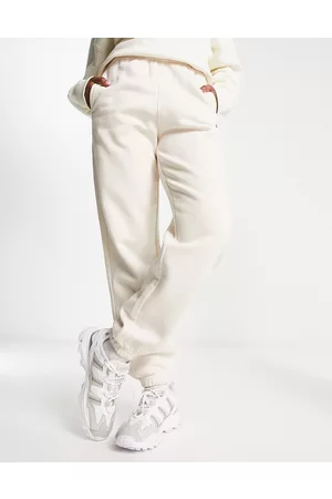adidas Essentials - Joggers in pile sporco