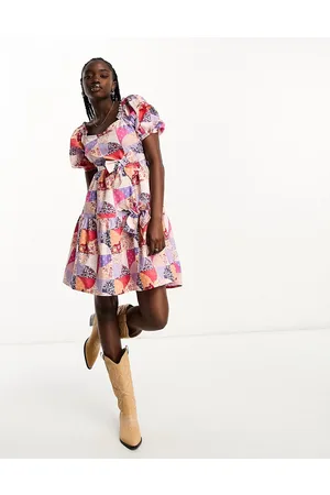 Neon Rose Vestito corto rosa con stampa effetto toppe