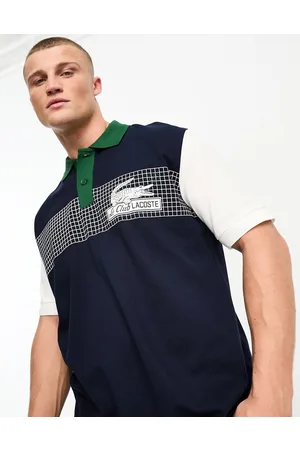 Lacoste Polo ampia color block con stampa sul davanti