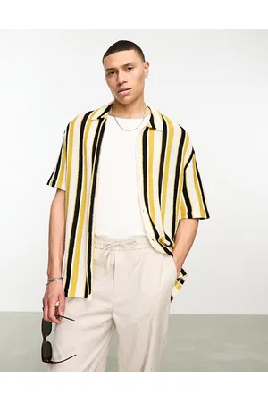 Bershka Polo in maglia a righe gialle