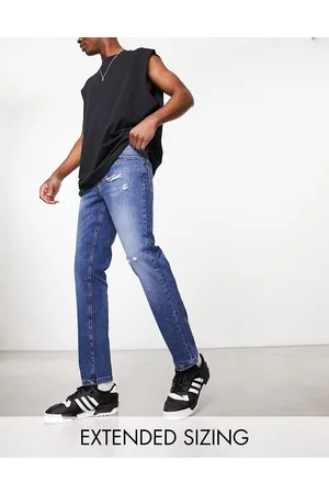 ASOS Jeans slim lavaggio medio con abrasioni