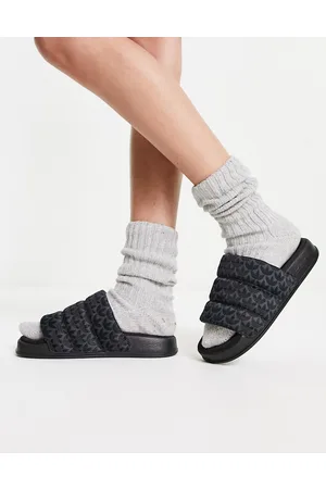 adidas Adilette - Sliders nere con suola spessa