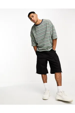 ASOS T-shirt comoda e verde a righe verticali lavorata a nido d