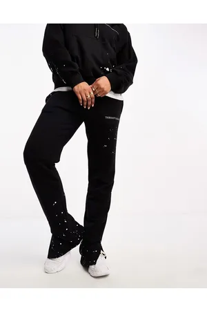 The Couture Club Joggers neri dritti con schizzi di vernice