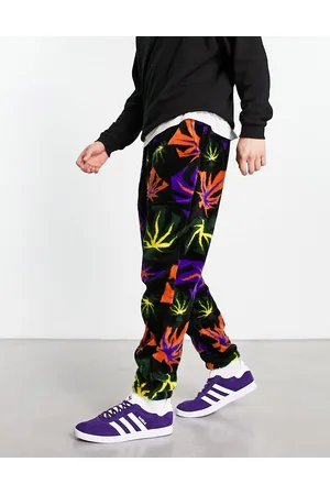 Huf Lowell - Joggers neri in pile borg jacquard con motivo stampato di foglie