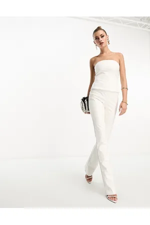 Naked Wardrobe Pantaloni bianchi a zampa in pelle sintetica in coordinato