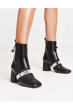 Moschino Stivali con tacco neri con dettaglio del logo