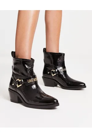 Moschino Stivali neri con fibbia e logo
