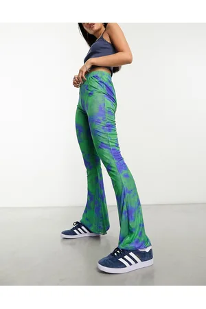 Bolongaro Pantaloni a zampa in rete con stampa tie-dye