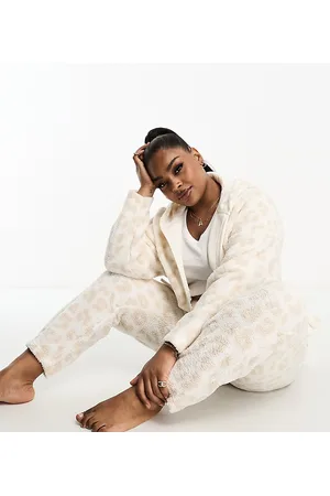 ASOS ASOS DESIGN Curve - Joggers da casa in pile borg animalier color crema in coordinato