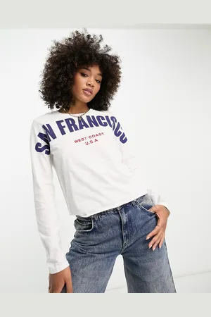 River Island Maglietta a maniche lunghe tagliata con scritta "San Francisco"