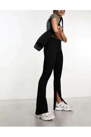 Weekday Dessa - Pantaloni slim neri con spacco sul fondo