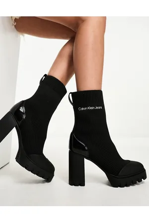 Calvin Klein Stivaletti a calza neri in maglia con plateau
