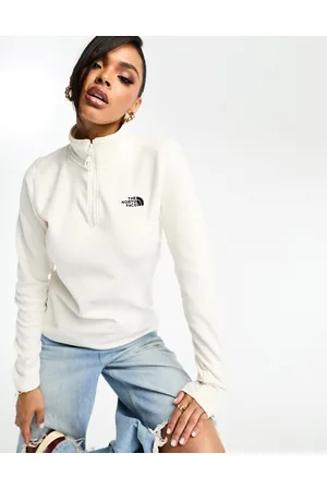 The North Face Glacier 100 - Pile color crema con zip corta