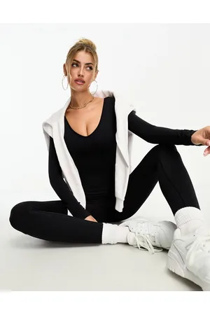 Missyempire Missy Empire - Tuta jumpsuit nera senza cuciture a maniche lunghe con scollo profondo