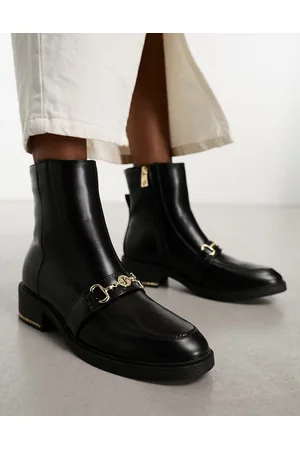 River Island Stivaletti neri con fibbia dorata