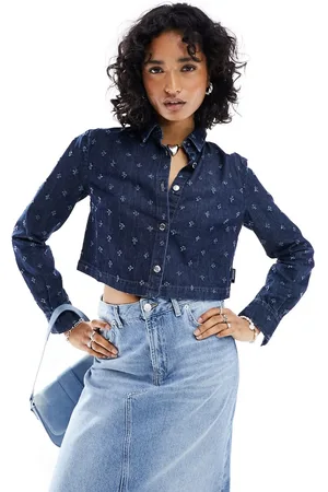 Moschino Giacca di jeans corta con dettaglio traforato color scuro in coordinato