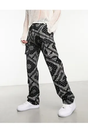 Karl Kani Pantaloni cargo neri con firma piccola e stampa cachemire