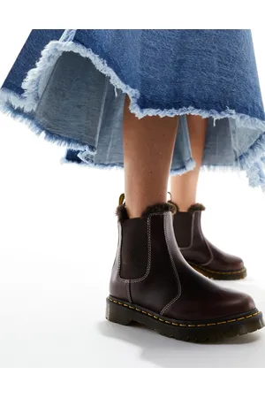 Dr. Martens 2976 Leonore - Stivaletti Chelsea in pelle scuro con interno in pelliccia