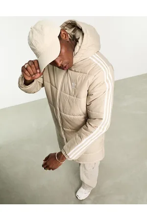 adidas Piumino beige taglio lungo con cappuccio e 3 strisce