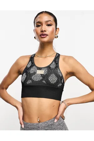 EA7 Brassière sportiva nera con stampa animalier