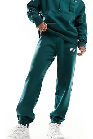 COLLUSION Joggers verdi con logo