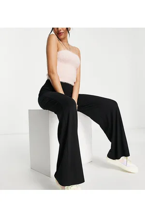 ASOS ASOS DESIGN Petite - Pantaloni basic in jersey con fondo ampio neri
