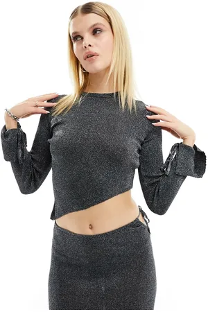 Bershka Maglione con orlo asimmetrico glitterato in coordinato
