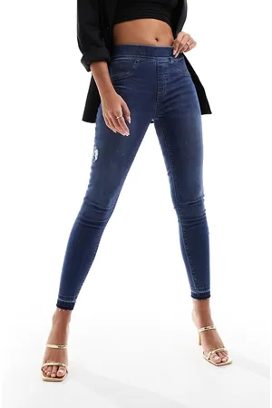 Spanx Jeans skinny modellanti e con effetto sollevante lavaggio medio invecchiato