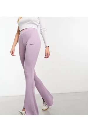 Nicce London Juno - Leggings a zampa chiaro con spacco